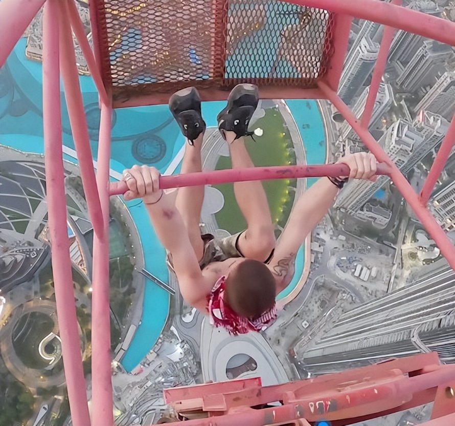学生冒充工人后，从迪拜1280米起重机上做各种体操动作，太危险了