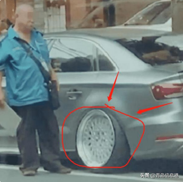 奥迪违章停车被城管举报，拖车师傅看了直摇头：这车没法拖