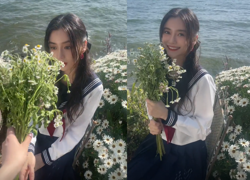 baby晒照庆33岁生日!穿短裙制服太少女,怀中大束野花焉巴巴