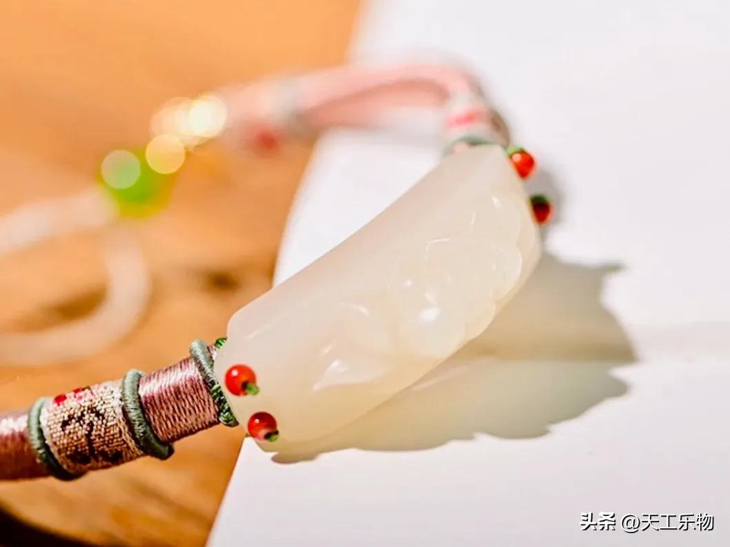 北京奥运会奖牌用什么玉（北京奥运的“金镶玉”奖牌，究竟是不是和田玉？）