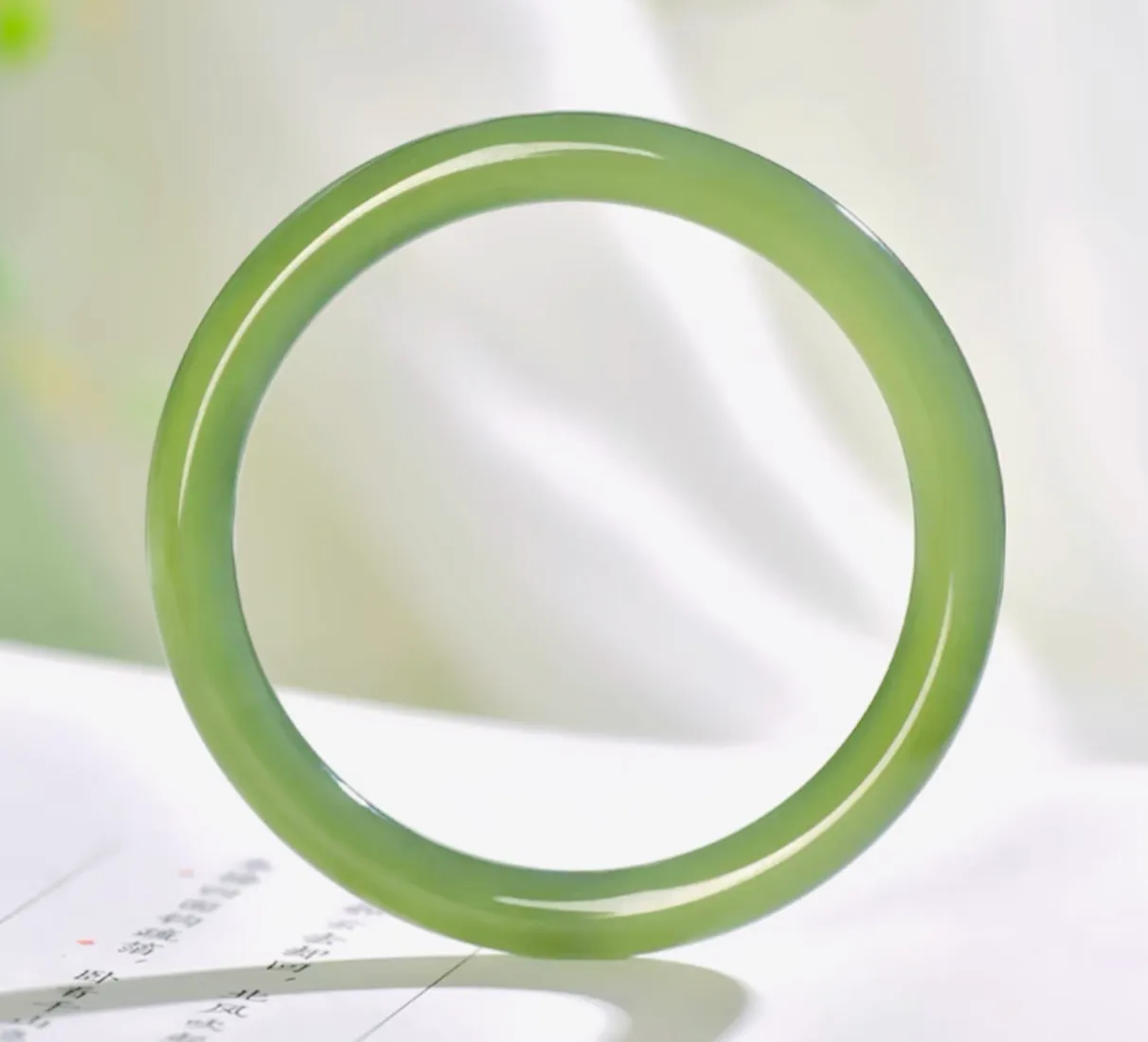 北京奥运会奖牌用什么玉（北京奥运的“金镶玉”奖牌，究竟是不是和田玉？）