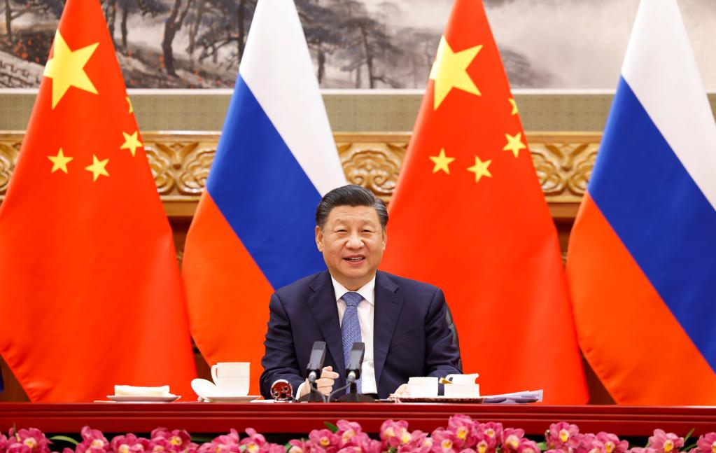 第一观察·瞬间 | 中俄元首视频会晤：相约北京见，携手向未来