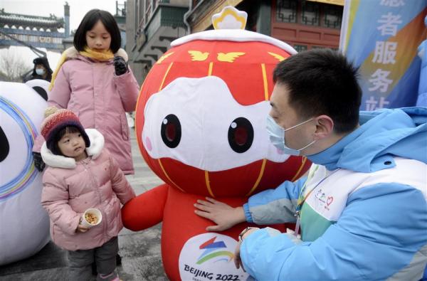 奥运志愿者(北京冬奥入门：志愿者是一道风景线，默默奉献的她们把最美微笑留给全世界)