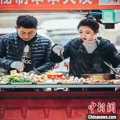 镜头里的“人世间”：西安“街拍师”捕捉“生活之暖”