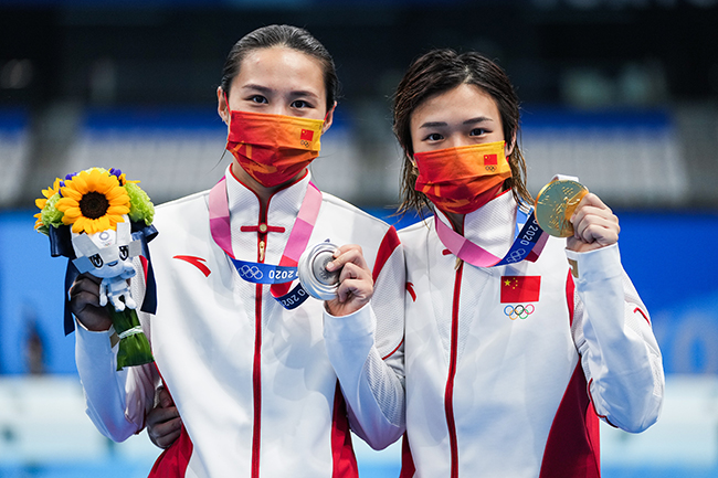 中国国家女子跳水队教练(聚焦 | 中国跳水女子跳板“王牌组合”升级当教练 奥运冠军从头学起)