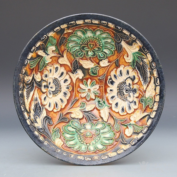 牡丹纹是一种典型的汉族纹样,自唐代以来,牡丹颇受世人喜爱,被视为