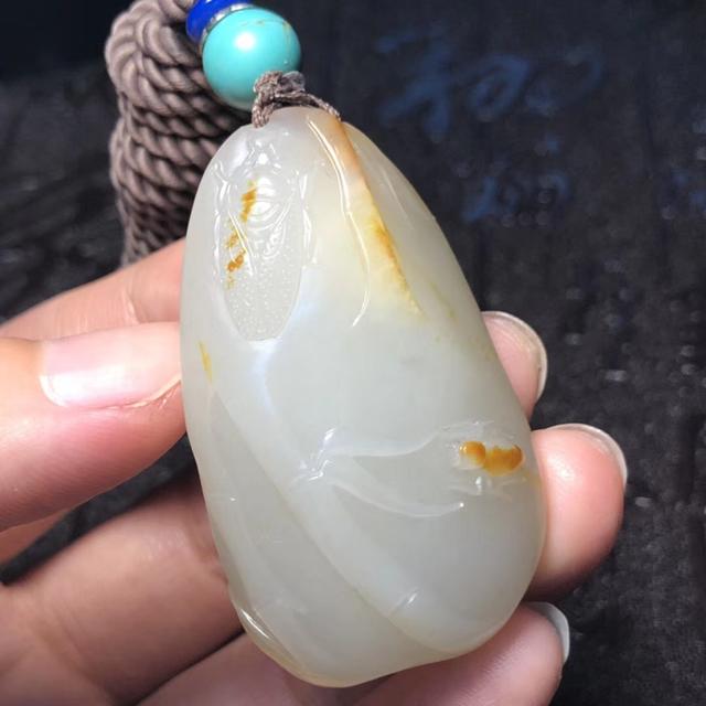 和田玉吊坠价格，足金和田玉吊坠多少钱一克（和田玉籽料的价格体系）