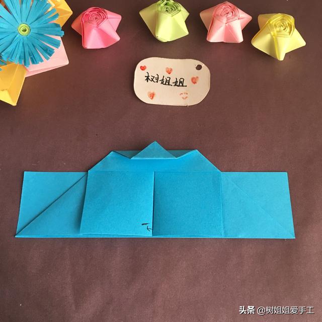 手工折爱心折法，手工折爱心教程（实用折纸：双爱心书签）