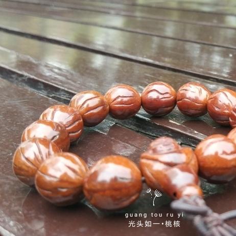 桃核是辟邪还是招鬼，桃子的桃核可以辟邪吗（我的文玩新宠——桃核手串）