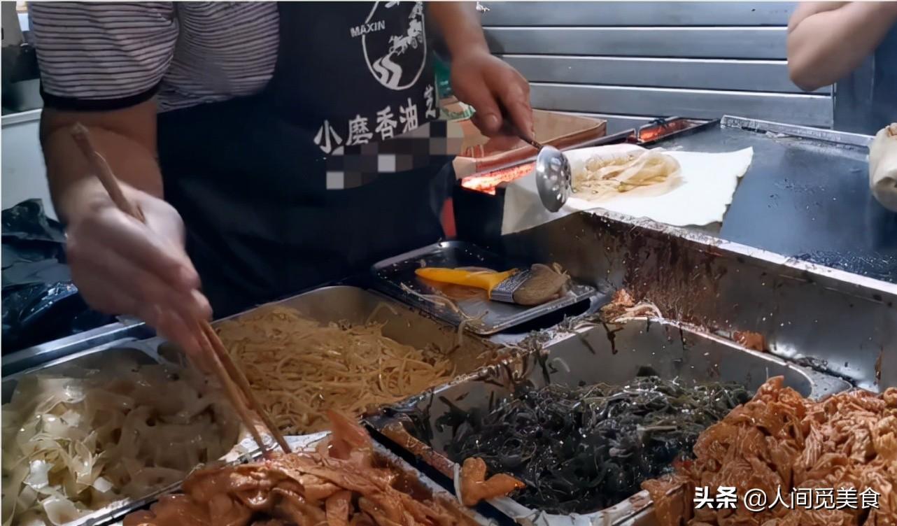 街头小吃摊(小吃加盟店最火爆的项目)