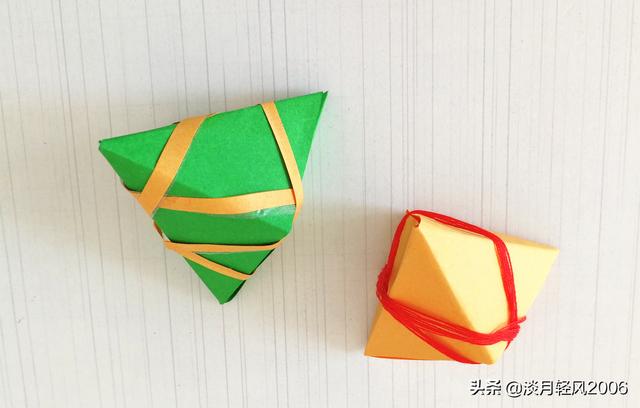 手工折纸粽子的做法，端午节小手工折纸粽子折法（一张纸条折一个粽子的方法）