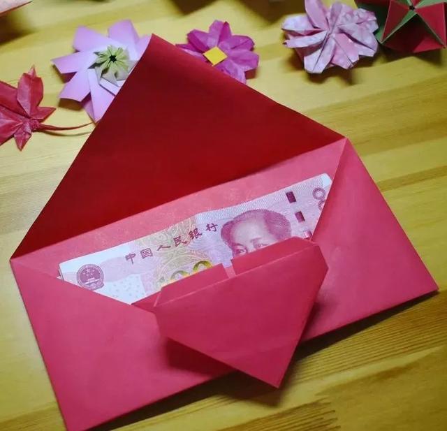 百元折爱心的步骤图解，用百元折心图解（完整一张纸折出爱心红包）