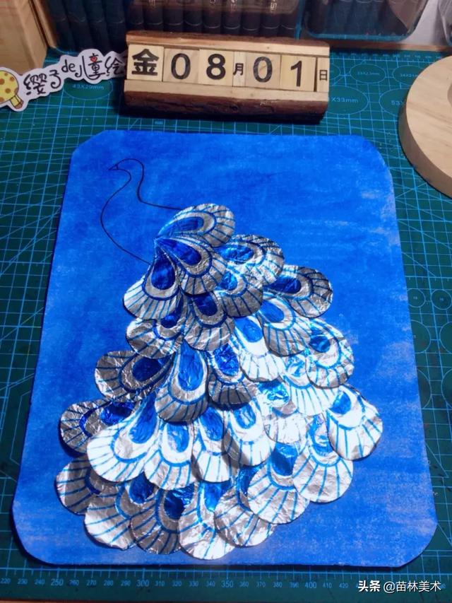 如何用各类树叶制作孔雀贴画，如何用各类树叶制作孔雀贴画视频（创意教程---孔雀手工画）