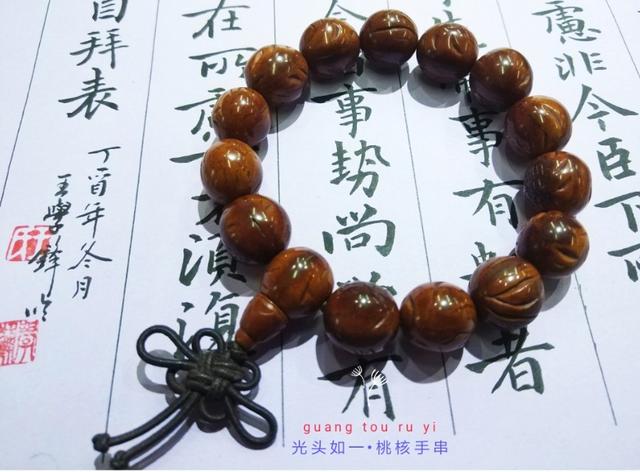 桃核是辟邪还是招鬼，桃子的桃核可以辟邪吗（我的文玩新宠——桃核手串）