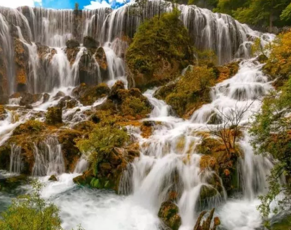 形容九寨沟美景的句子，九寨沟美景怎么形容（说走就走----记九寨沟）