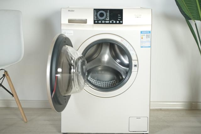 如何使用海尔蒸汽电熨斗，海尔蒸汽电熨斗怎么用（海尔EG100HB209G洗衣机体验）