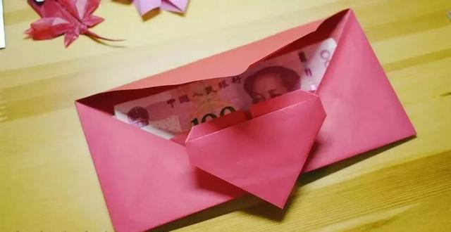 百元折爱心的步骤图解，用百元折心图解（完整一张纸折出爱心红包）