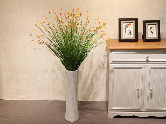 客厅风水大忌假花,客厅摆放假花的风水讲究有哪些(客厅放假花好不好)