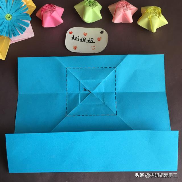 手工折爱心折法，手工折爱心教程（实用折纸：双爱心书签）
