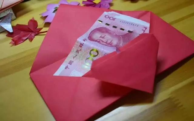 百元折爱心的步骤图解，用百元折心图解（完整一张纸折出爱心红包）
