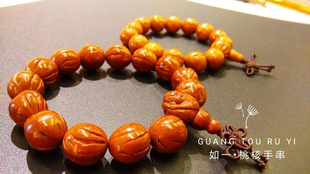 桃核是辟邪还是招鬼，桃子的桃核可以辟邪吗（我的文玩新宠——桃核手串）