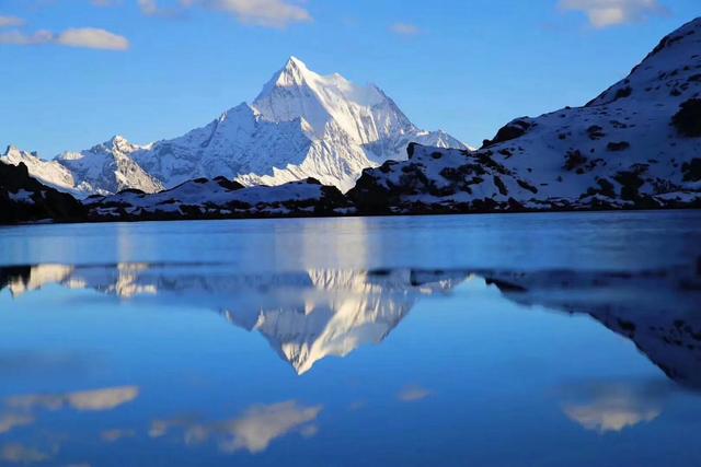稻城海拔是多少，稻城海拔多少米会有高原反应吗有老虎吗（为什么有些游客说不去后悔一生）