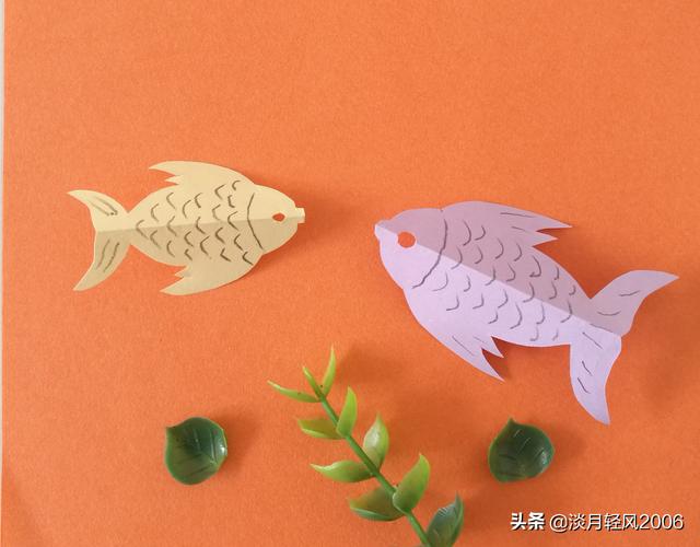 对折剪纸怎么剪，对折剪纸怎么剪春（一张小纸片剪出一条可爱小鱼儿）