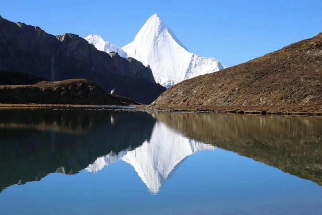 稻城海拔是多少，稻城海拔多少米会有高原反应吗有老虎吗（为什么有些游客说不去后悔一生）