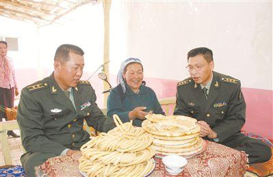 家电维修广告维语版 8任团长接力帮扶一个民族村