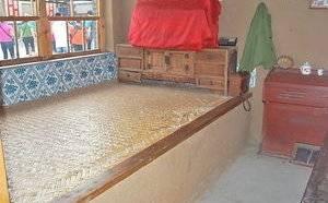 炕是什么，炕是什么生肖（北方人的炕，南方人的床）