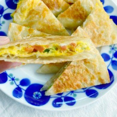 怎样做鸡蛋手抓饼，鸡蛋手抓饼的做法视频教程（5分钟快手早餐）