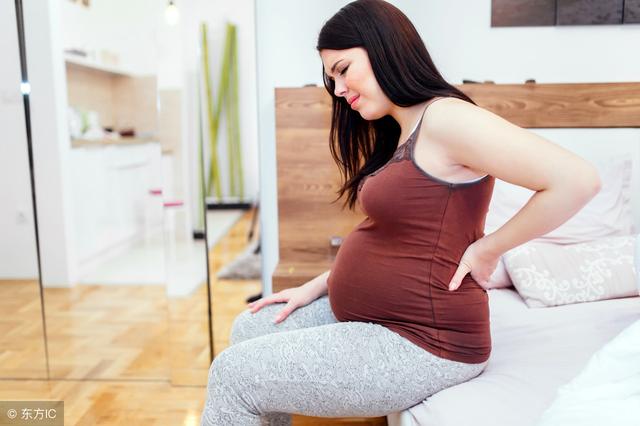 预产期腰酸疼是在开指吗，腰酸是不是要临产了（分娩说：离预产期只有十几天了）