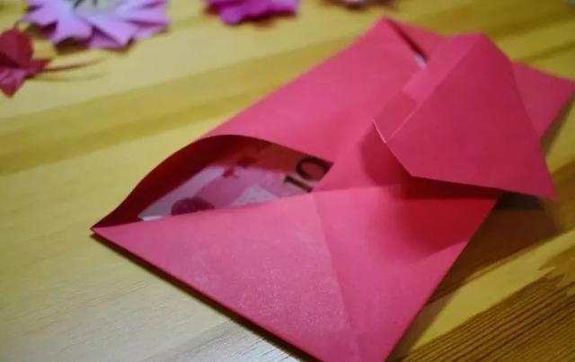 百元折爱心的步骤图解，用百元折心图解（完整一张纸折出爱心红包）