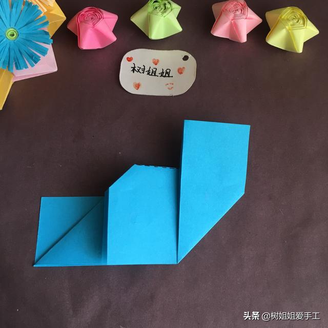 手工折爱心折法，手工折爱心教程（实用折纸：双爱心书签）