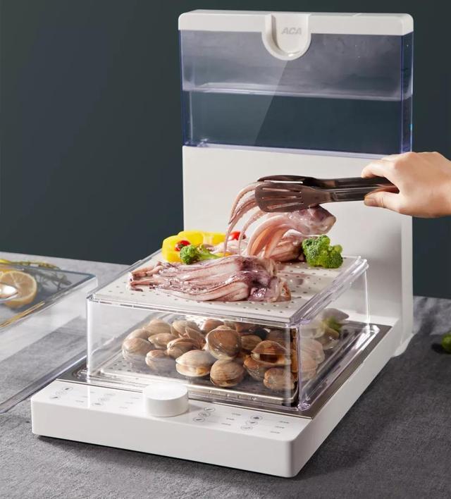 如何用蒸锅热饭，如何用蒸锅热饭视频（这个蒸锅能一次搞定全家饭菜）