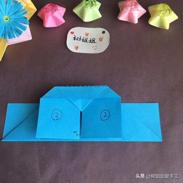 手工折爱心折法，手工折爱心教程（实用折纸：双爱心书签）