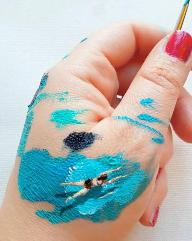 漂亮的手掌画，漂亮的手掌画图片（她在手心画了一片海）