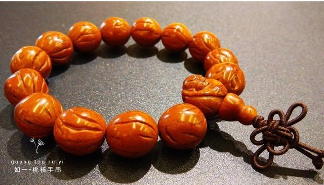 桃核是辟邪还是招鬼，桃子的桃核可以辟邪吗（我的文玩新宠——桃核手串）