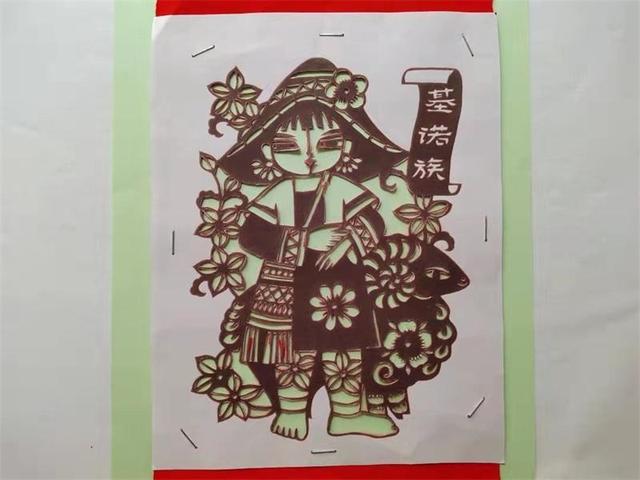 2,56个民族之基诺族剪纸:太阳鼓响起,迎来活泼俏皮的尖顶帽少女