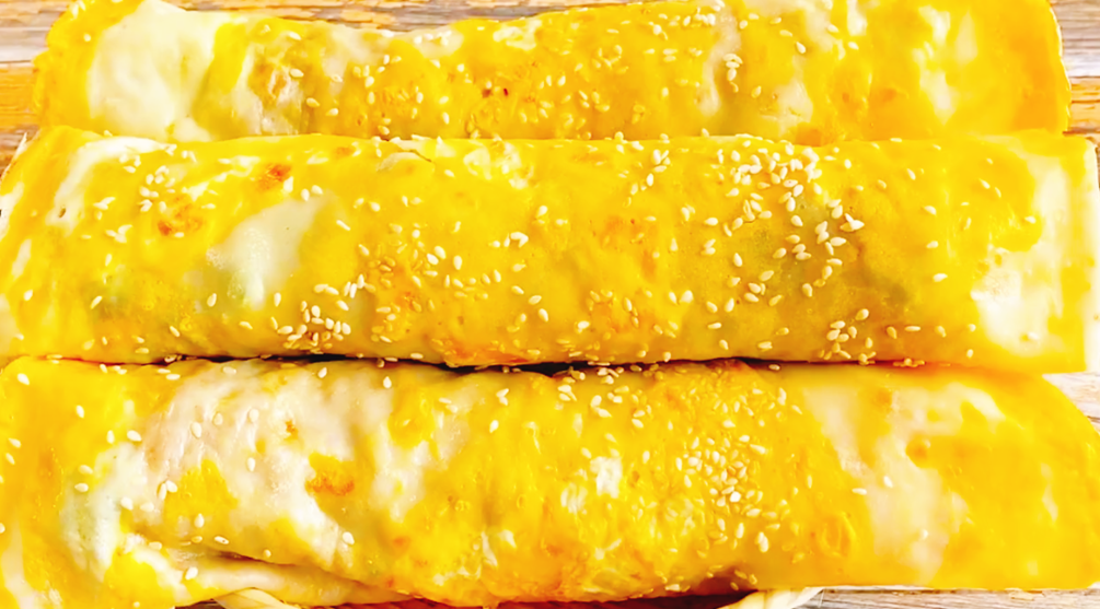 【早餐鸡蛋卷饼】做法步骤图 饼柔软筋道又营养 全家人都爱吃-起舞食谱网