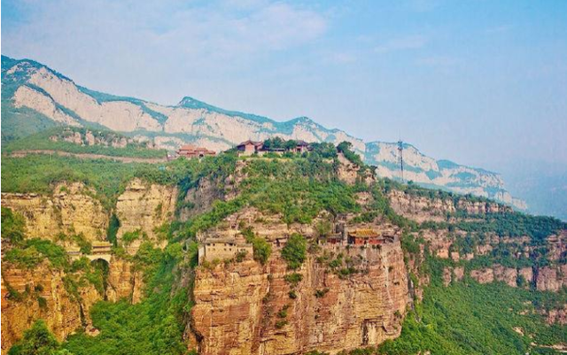 僧、尼、道共居一山修行  承德丰宁白云古洞景区，僧、尼、道共居一山修行（有一桥飞架两山之间的千年古刹）