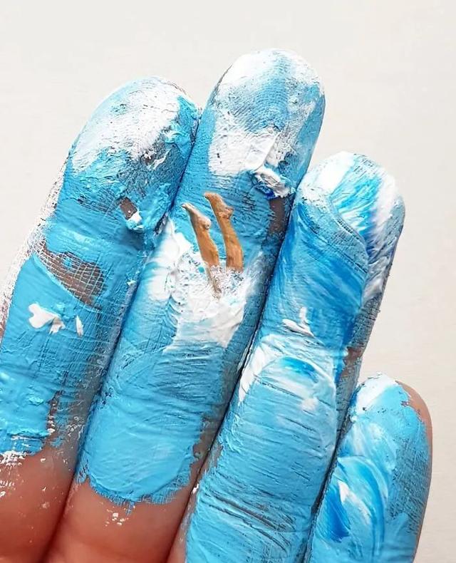 漂亮的手掌画，漂亮的手掌画图片（她在手心画了一片海）