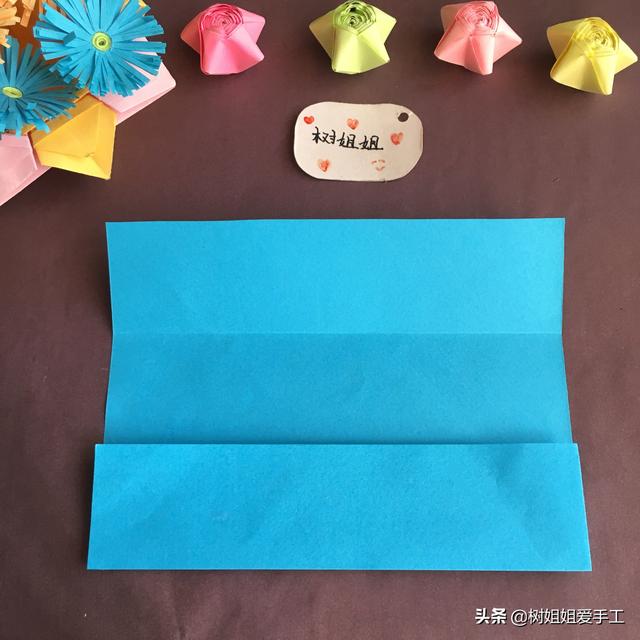 手工折爱心折法，手工折爱心教程（实用折纸：双爱心书签）