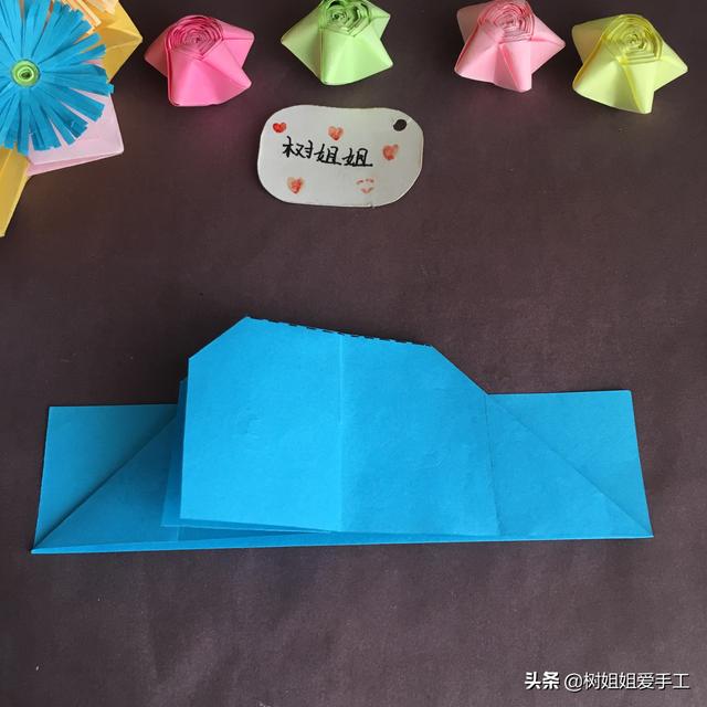 手工折爱心折法，手工折爱心教程（实用折纸：双爱心书签）