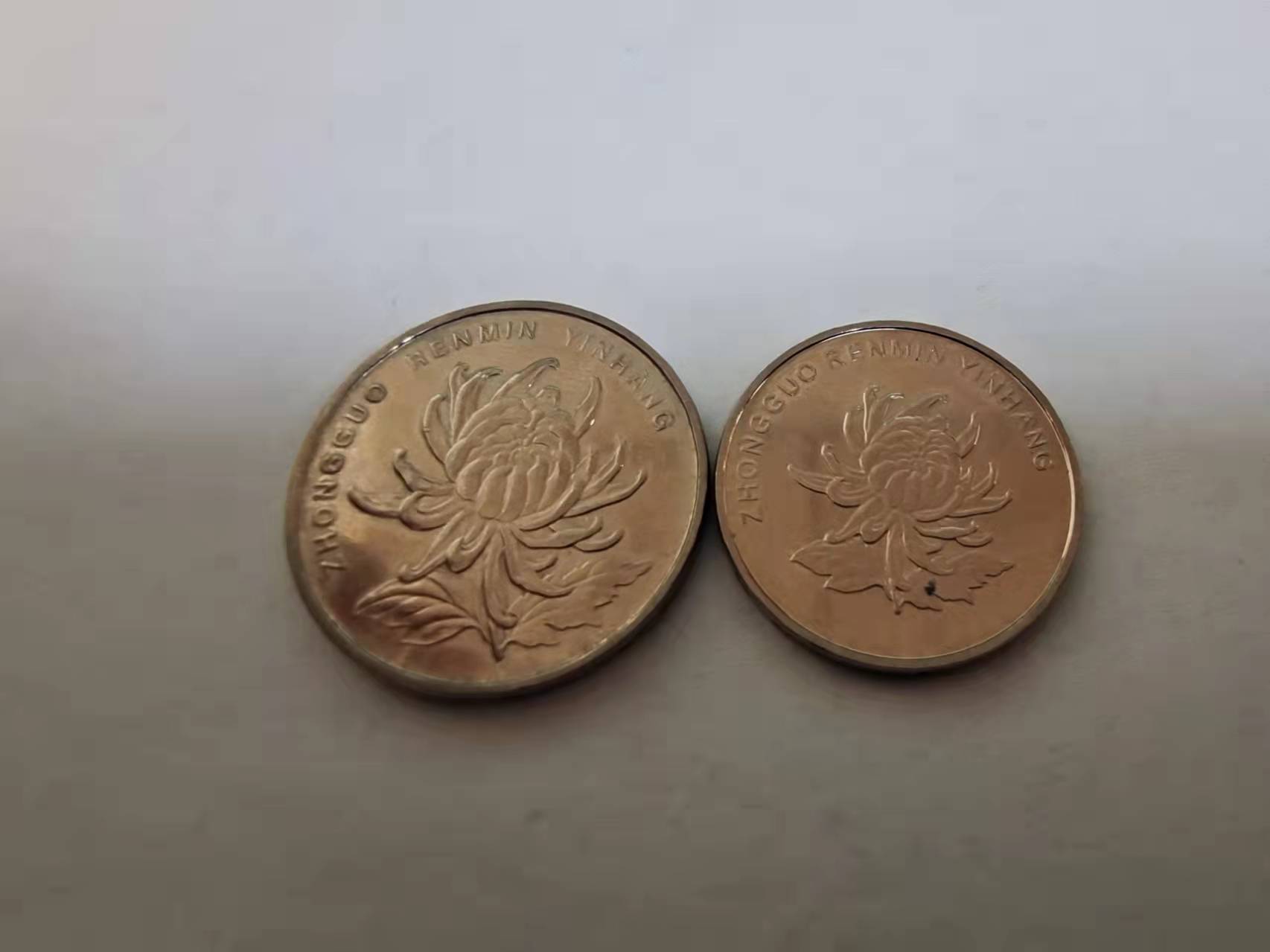 元硬币重量(每张一元人民币重量)"