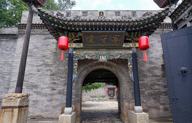 山西祁县乔家大院是文化遗产吗，为何日军当时不敢抢掠