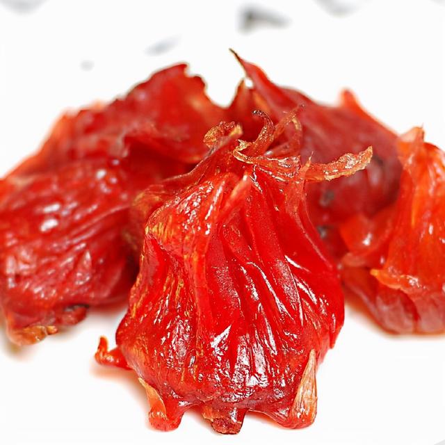 蜜饯的做法，酸酸甜甜紫红色的果脯蜜饯（橄榄蜜饯的做法）
