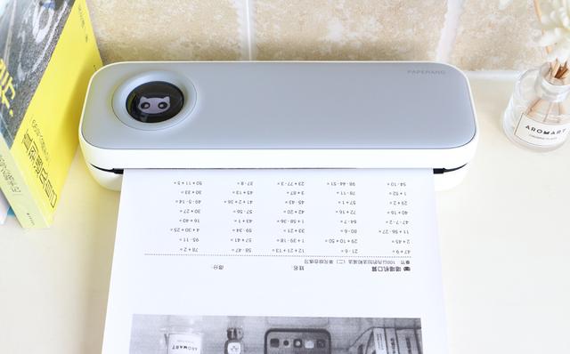 喵喵机怎么换纸，喵喵机怎么换纸p2（5.8亿题库、打印不用墨、不插电）