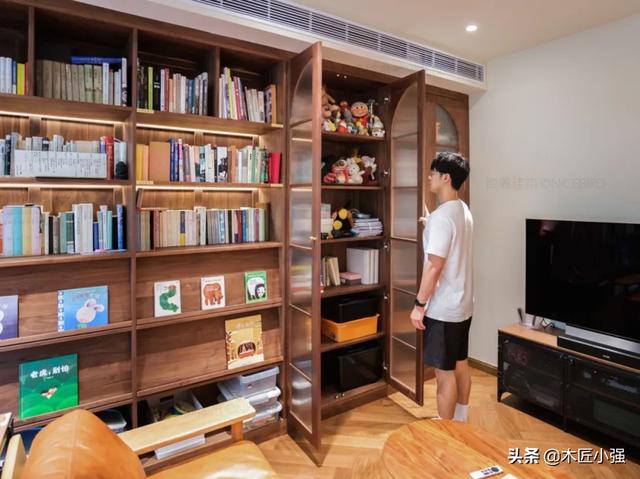 图书摆放造型，图书摆放造型图片大全（客厅图书馆美出新高度）