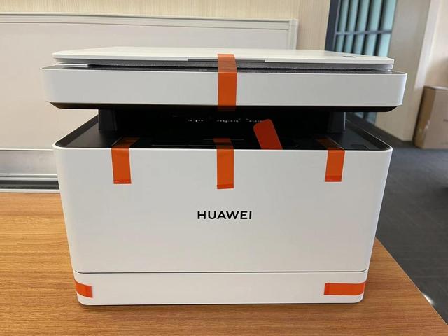 打印机怎么装纸，热敏小票打印机怎么装纸（华为打印机的正确打开方式）